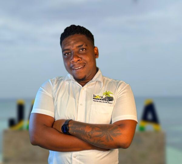 Experienced Jamaican tour driver providing safe and reliable transportation in Montego Bay