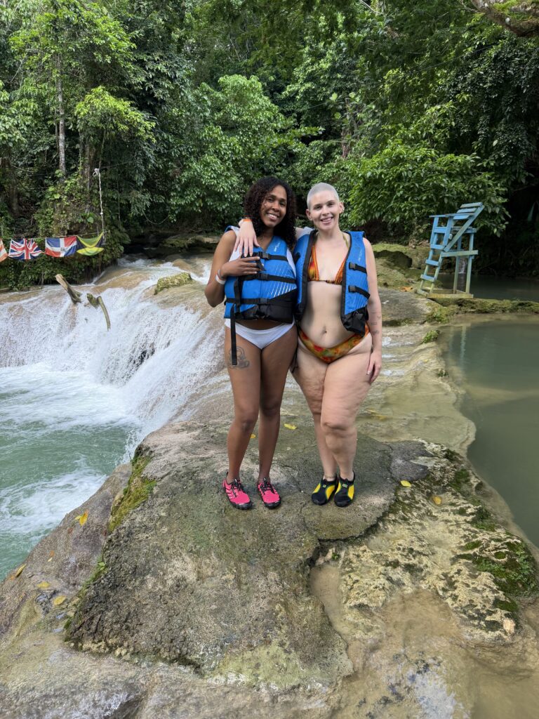 Blue Hole Jamaica waterfall and turquoise natural pool surrounded by lush tropical forest in Ocho Rios